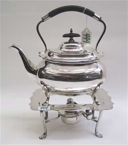 Appraisal: WALKER HALL SHEFFIELD SILVER PLATE TEAPOT WARMING STAND teapot with