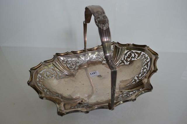 Appraisal: STERLING SILVER FRUIT BASKET PIERCED WITH A SWING HANDLE ONE