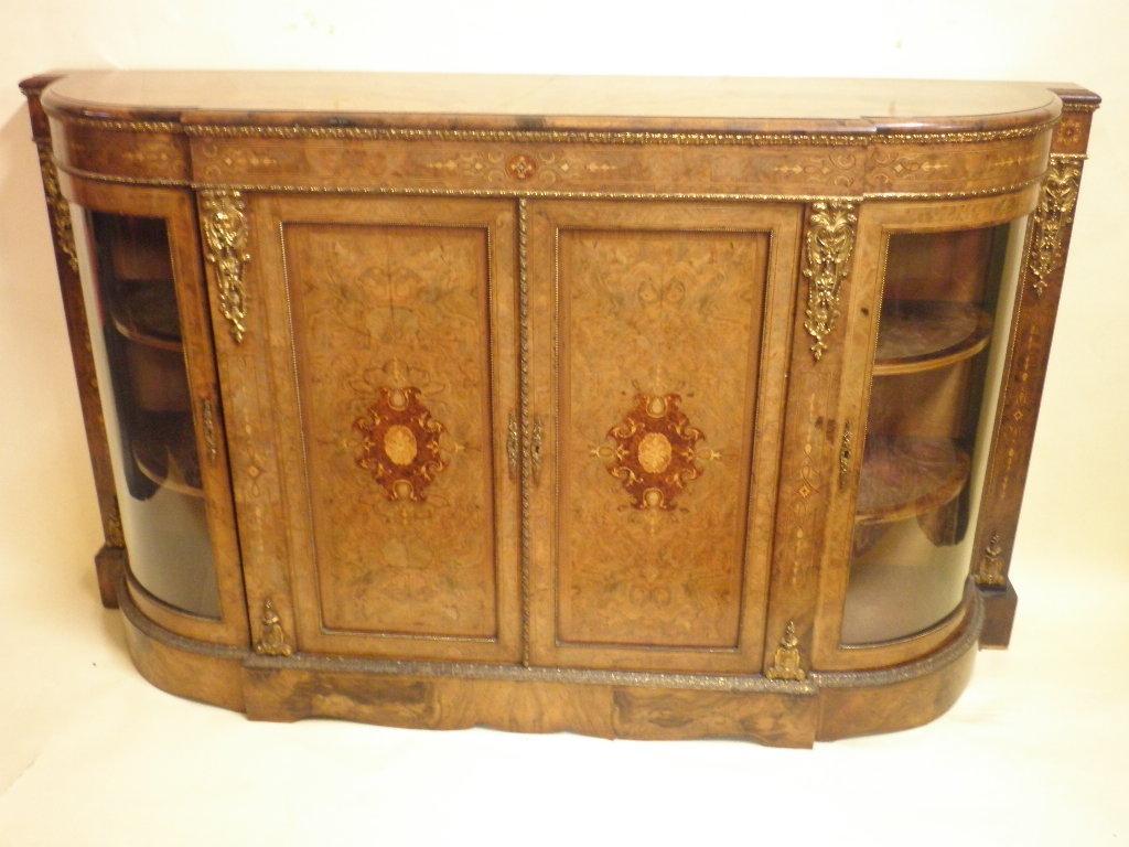 Appraisal: A Victorian burr walnut credenza with gilt metal mounts of