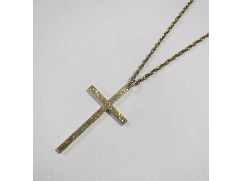 Appraisal: Nine carat gold cross pendant on ct gold neck chain