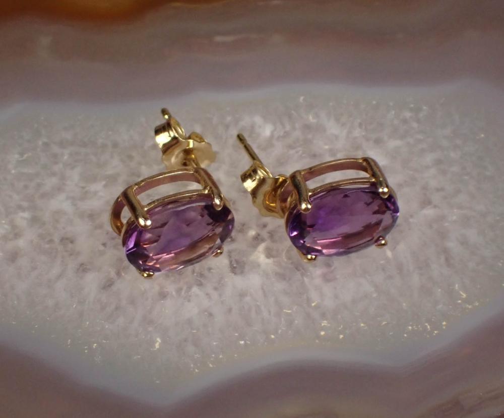 Appraisal: PAIR OF AMETHYST AND FOURTEEN KARAT GOLD EAR STUDS each