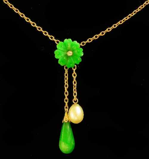 Appraisal: A modern gold coloured metal mounted jade pearl and diamond