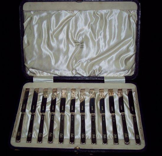 Appraisal: Twelve tea knives the handles monogrammed Sheffield