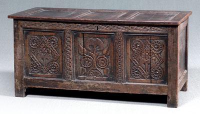 Appraisal: Early English oak lift top chest front with three floral