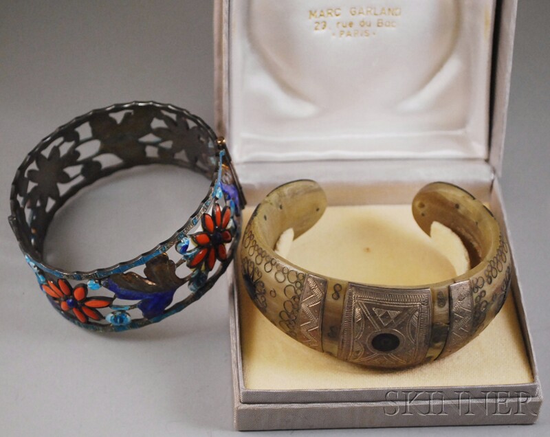 Appraisal: Two Bracelets a brass-mounted horn cuff in box from Marc