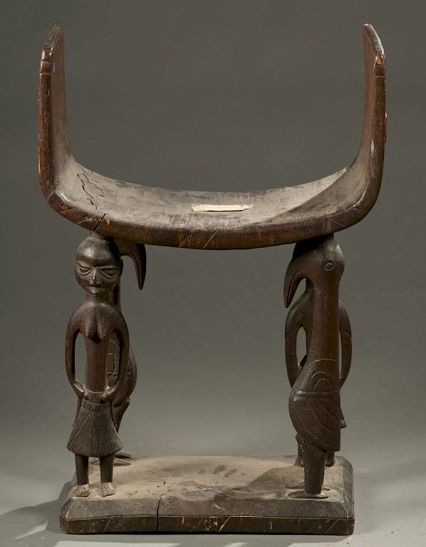 Appraisal: Yoruba caryatid stool th century A caryatid stool with standing