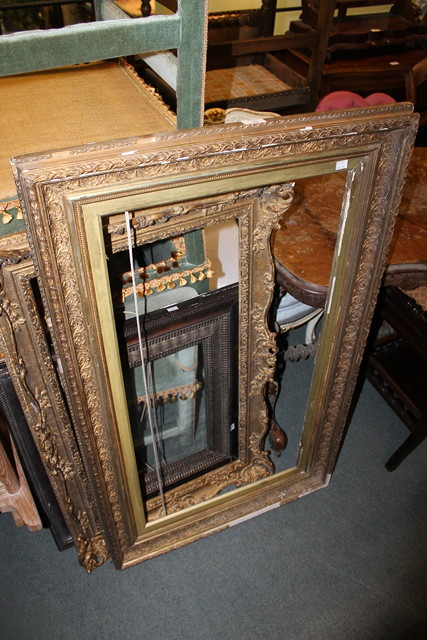 Appraisal: A VICTORIAN GILT PLASTER PICTURE FRAME with foliate scroll decoration