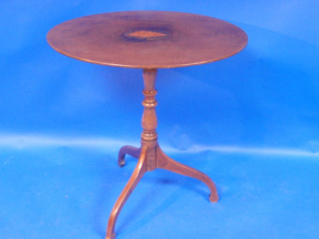 Appraisal: Georgian mahogany oval tripod table the centre with inlaid shell