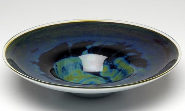 Appraisal: KEN BOCHELL Blown glass centerbowl in shades of mottled blue