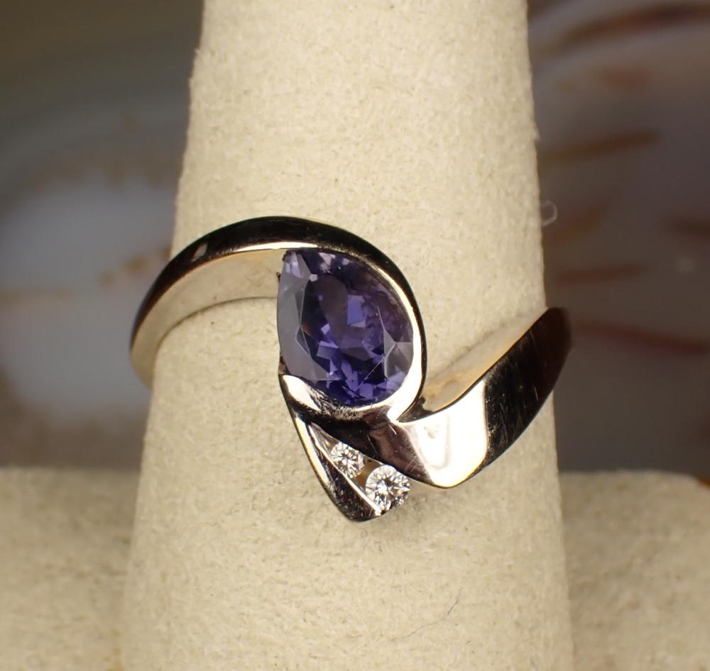 Appraisal: IOLITE DIAMOND AND FOURTEEN KARAT GOLD RING The white gold