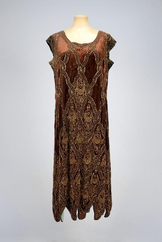 Appraisal: BEADED VELVET DINNER DRESS s Brown silk heavily decorated with