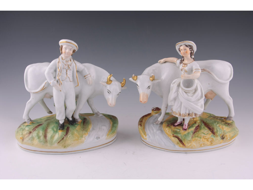 Appraisal: Pair of Staffordshire Figures with Cows English mid- th c