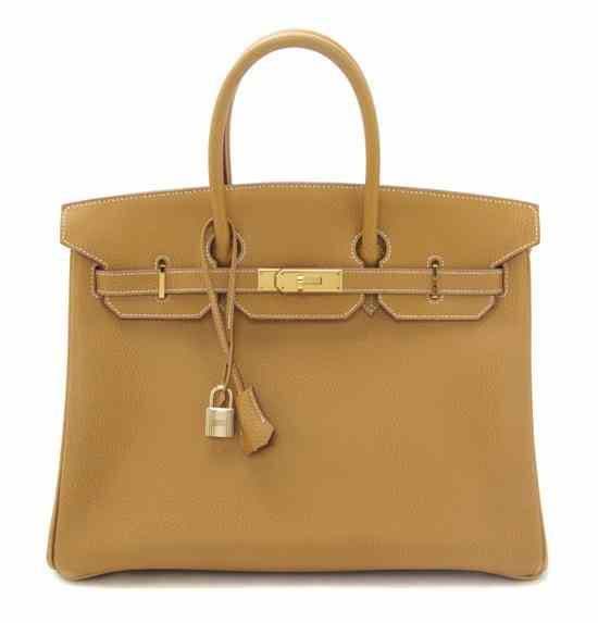 Appraisal: An Hermes Tan Leather Birkin Bag gold hardware with lock