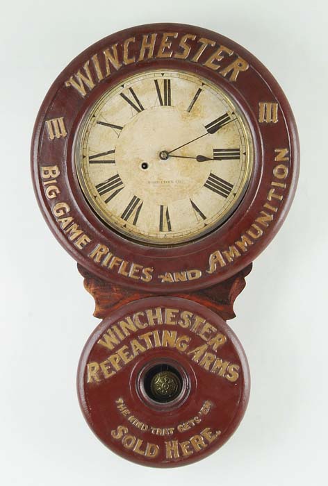 Appraisal: BAIRD WINCHESTER ADVERTISING CLOCK Antique figure- Baird clock with raised