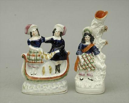 Appraisal: English Figural Highland Couple together with a Figural Spill Vase