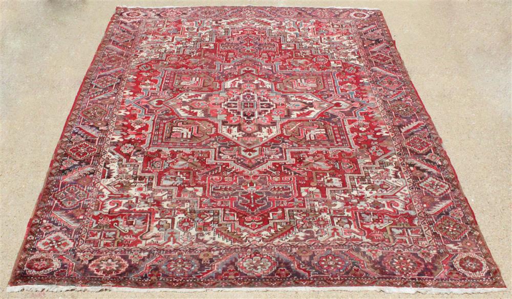 Appraisal: PERSIAN GERAVAN WOOL RUG central medallion surrounded by multiple borders