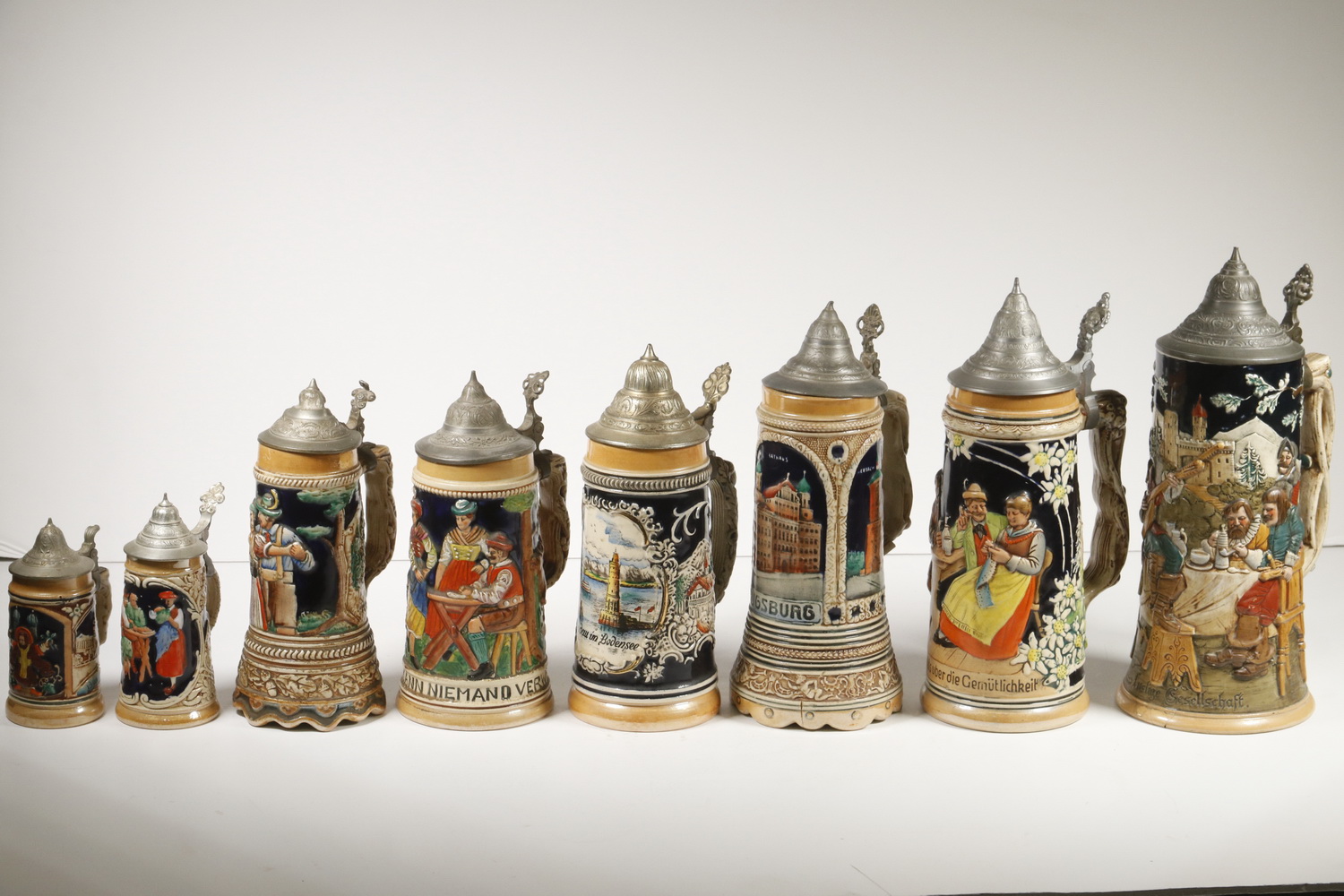 Appraisal: GERMAN LIDDED STEINS Collection of th c German Relief Molded