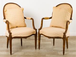 Appraisal: Pair of Louis XVI-style fauteuils with carved walnut frames modern