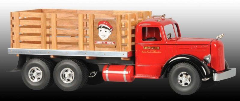 Appraisal: Pressed Steel Smitty Toys Stake Truck w Box Description Fred