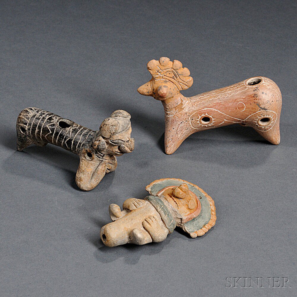 Appraisal: Three Ecuadorian Pre-Columbian Musical Instruments a pottery human effigy whistle