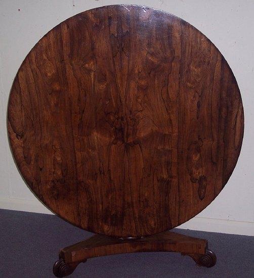 Appraisal: A Regency rosewood circular breakfast table with finely figured top