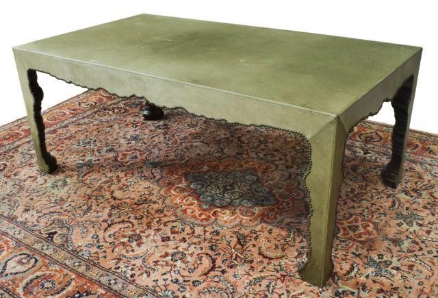 Appraisal: Contemporary leather-clad coffee table th c with nailhead trim shaped