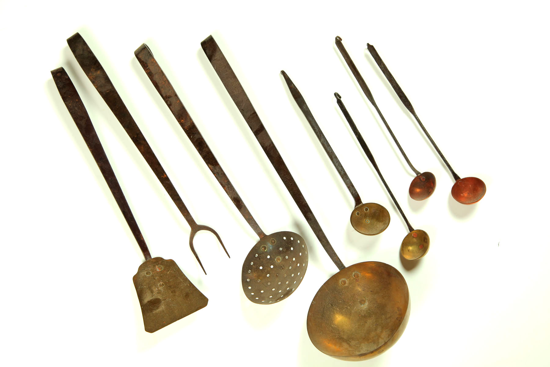 Appraisal: GROUP OF KITCHEN UTENSILS American th century wrought iron brass