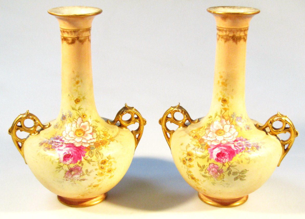 Appraisal: A pair of Edwardian vases each bellied circular body transfer