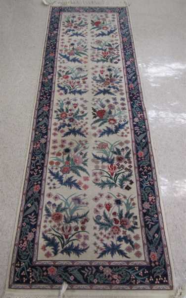 Appraisal: HAND KNOTTED ORIENTAL RUNNER Sino-Persian repeating rectangular floral groups on