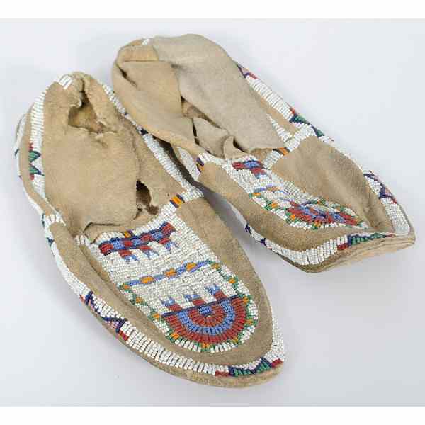 Appraisal: Cheyenne Beaded Hide Moccasins sinew-sewn and beaded in colors of