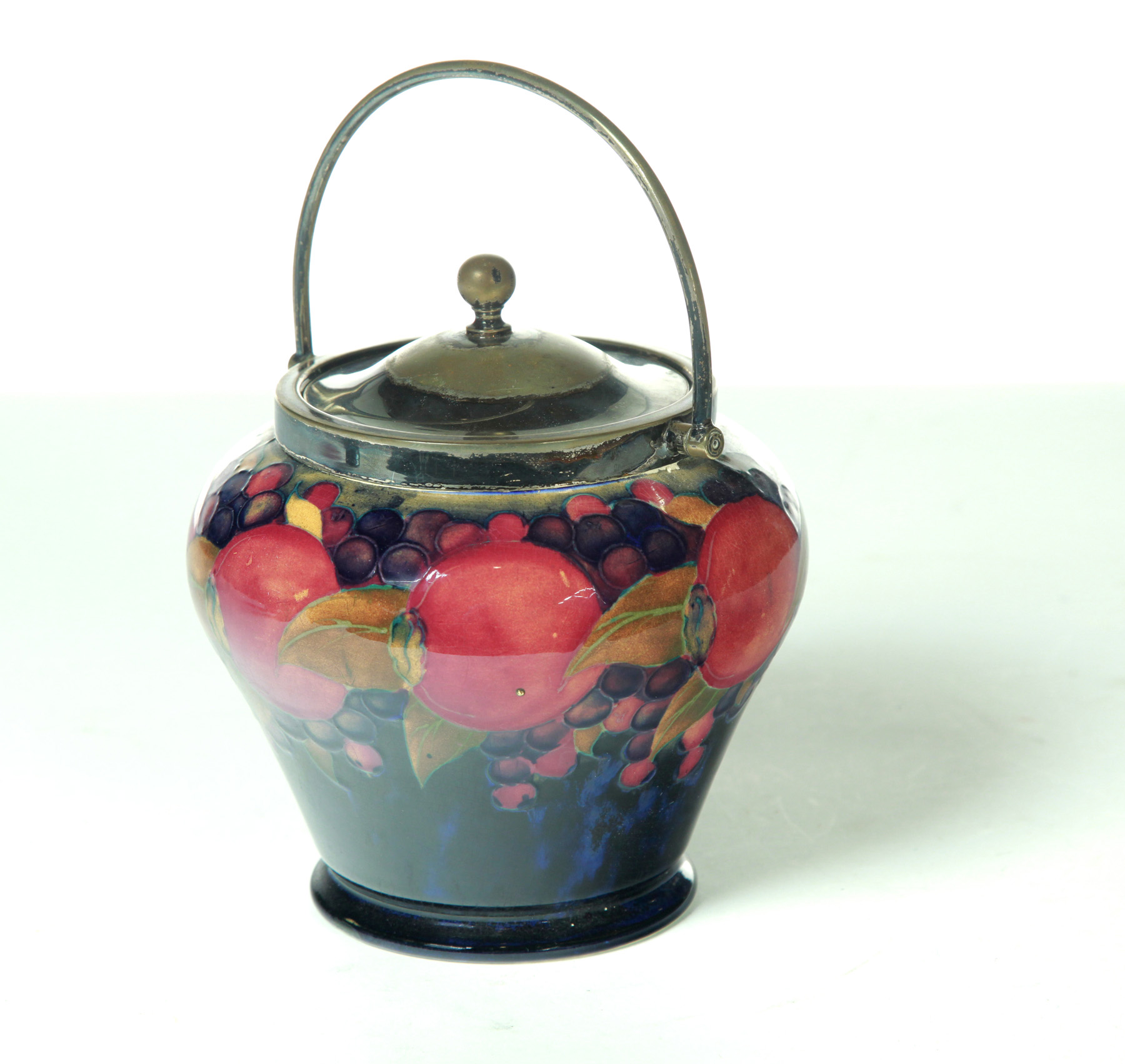 Appraisal: MOORCROFT BISCUIT JAR England st quarter- th century Bold colored