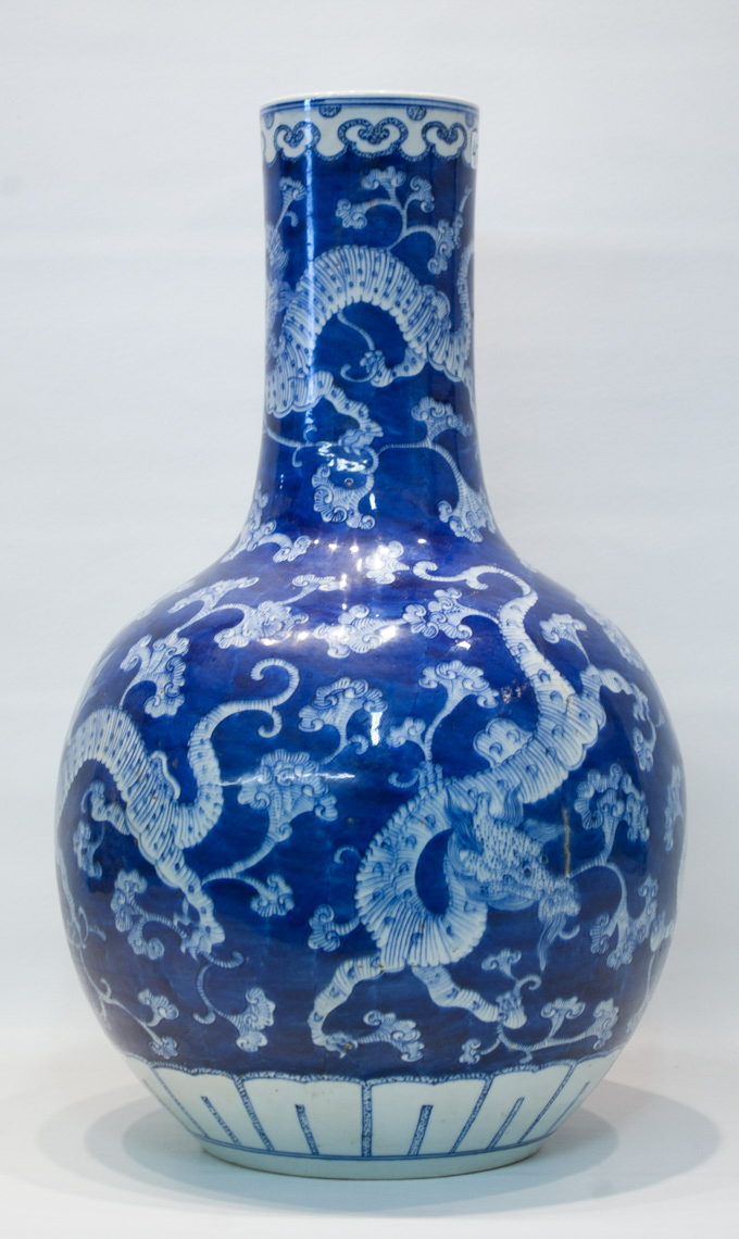 Appraisal: CHINESE QING STYLE BLUE AND WHITE PORCELAIN VASE bottle form