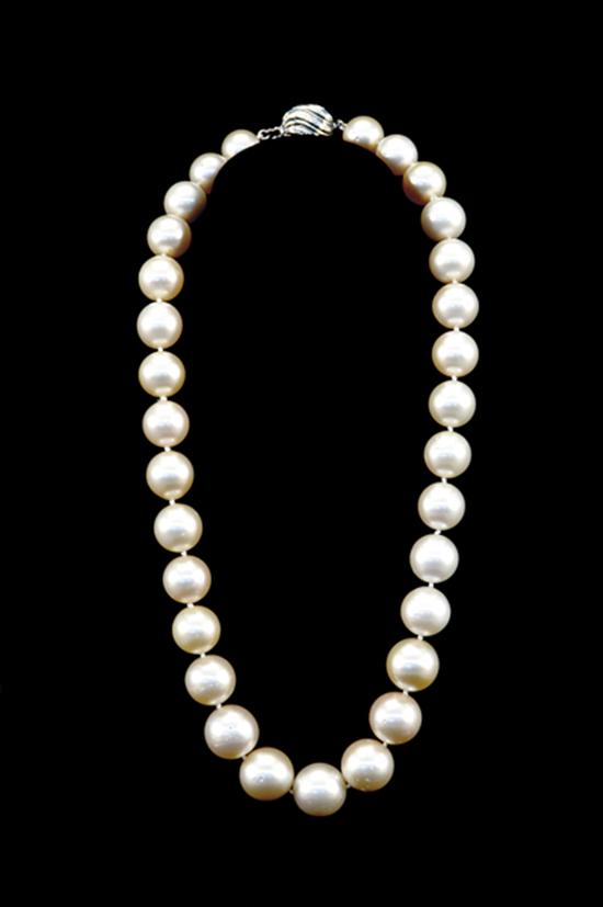 Appraisal: South sea pearl necklace thirty-one light cream colored pearls -