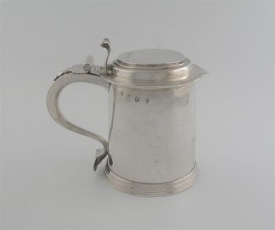 Appraisal: A Queen Anne tankard slightly tapering with a skirted base