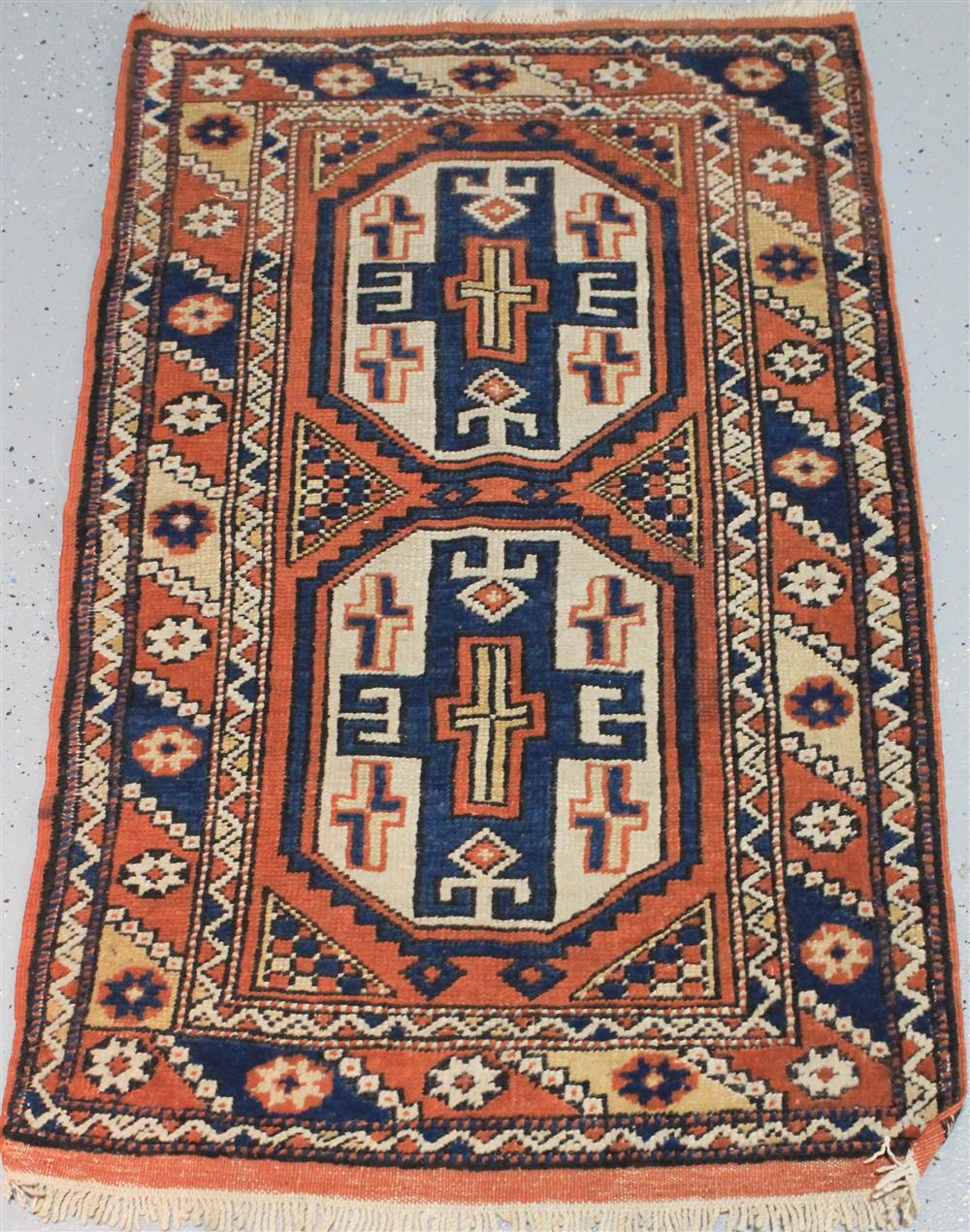 Appraisal: PERSIAN TRIBAL RUG having geometric patterns and multiple borders approx