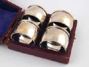 Appraisal: A set of four silver napkin rings Birmingham in fitted