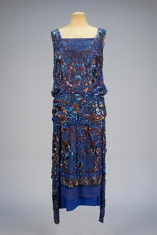 Appraisal: SEQUINED CHIFFON EVENING DRESS s Sapphire blue silk decorated with