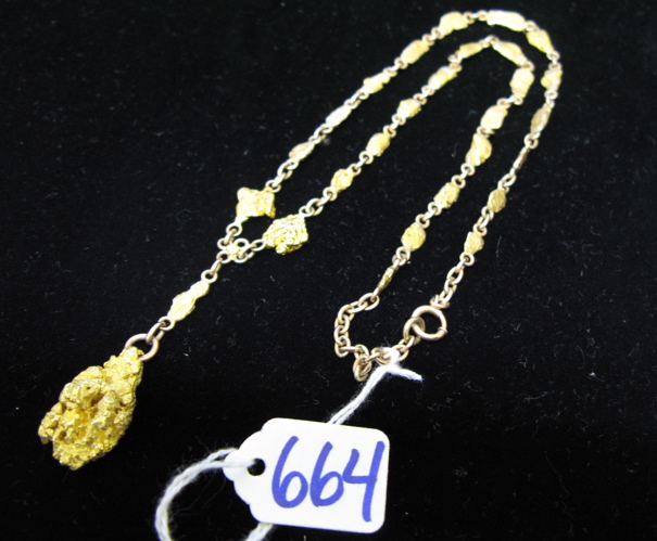 Appraisal: EIGHTEEN KARAT YELLOW GOLD PENDANT NECKLACE inch chain suspending a