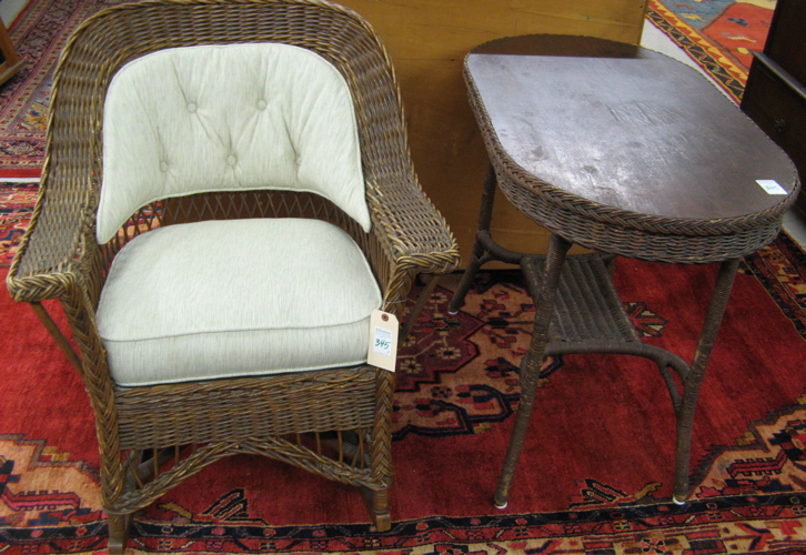 Appraisal: WICKER ROCKER AND LAMP TABLE American c 's The lot