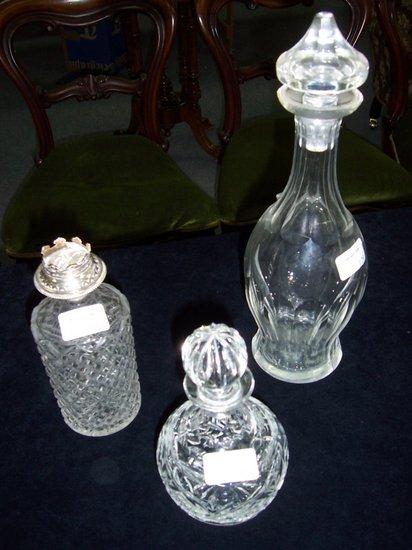 Appraisal: A cylindrical cut glass decanter with silver mounts and monogrammed