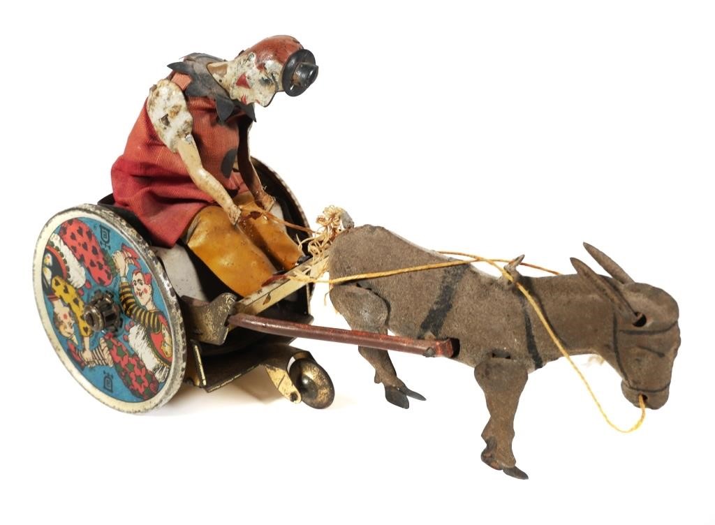 Appraisal: Lehmann stubborn donkey with clown cart tin litho wind up