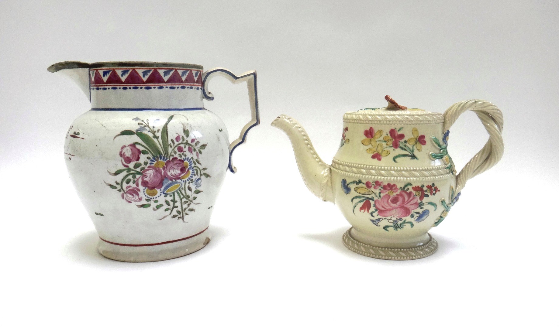 Appraisal: A creamware teapot and cover circa with spiral twist handle