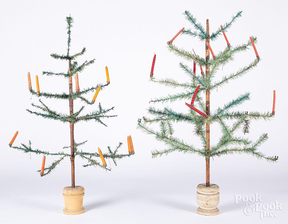 Appraisal: Two German feather trees with candles Two German feather trees