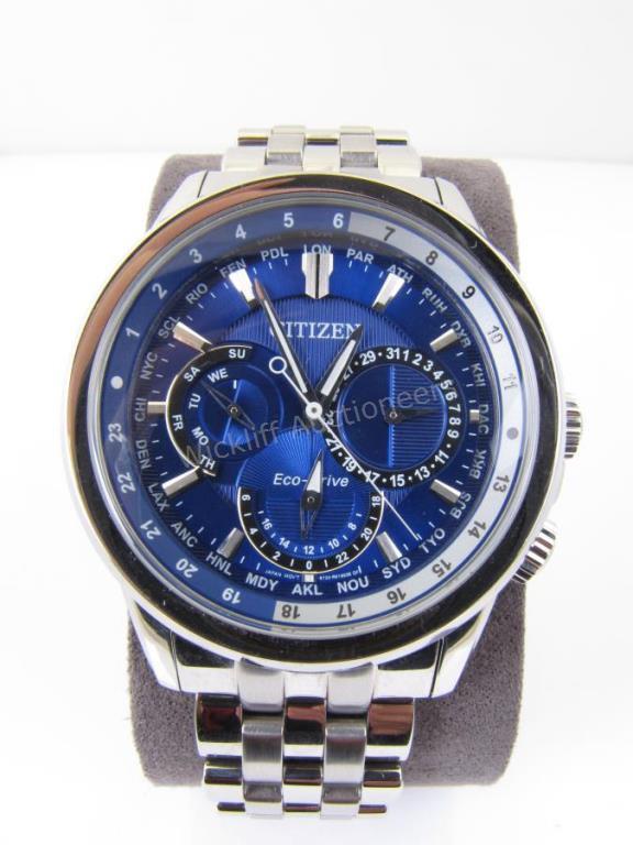 Appraisal: A gentleman's Citizen Eco Drive Calendrier watch featuring -city world