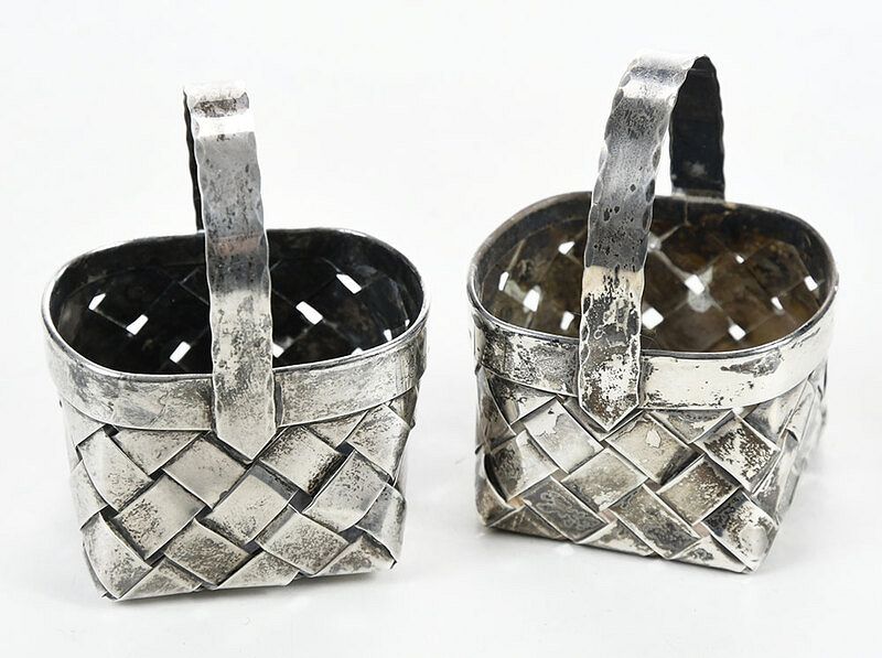 Appraisal: Two Cartier Sterling Baskets th century woven silver basket form