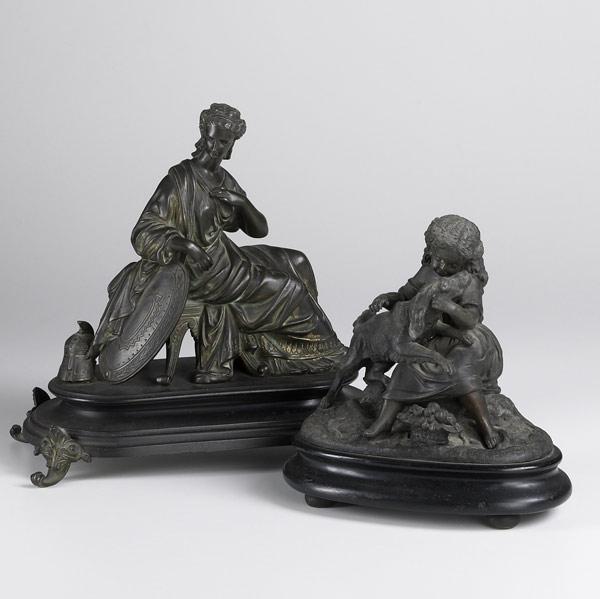 Appraisal: WHITE METAL FIGURES Two pieces child with dog and a