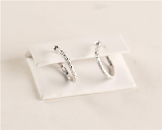 Appraisal: A Pair of Sterling and Diamond Hoop Earrings the hoops