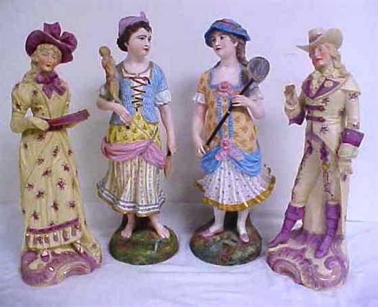 Appraisal: Two pair of bisque porcelain figurines the first a gentleman