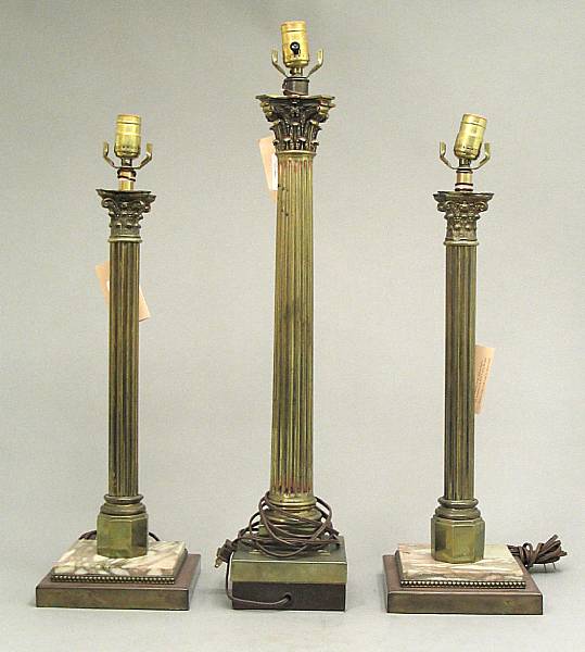 Appraisal: A pair and single Neoclassical style brass columnar lamps second