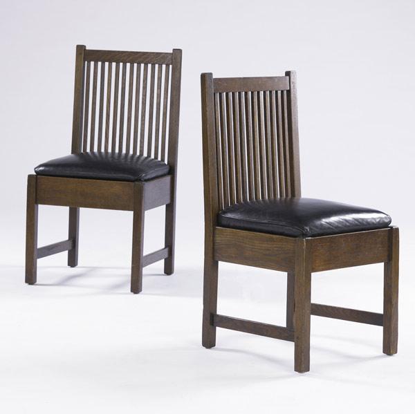 Appraisal: GUSTAV STICKLEY Pair of spindled slipper chairs no with drop-in